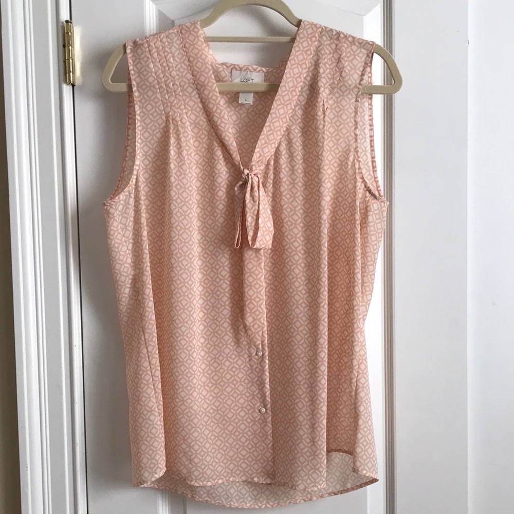 Feminine Vintage-Inspired Sleeveless Blouse
